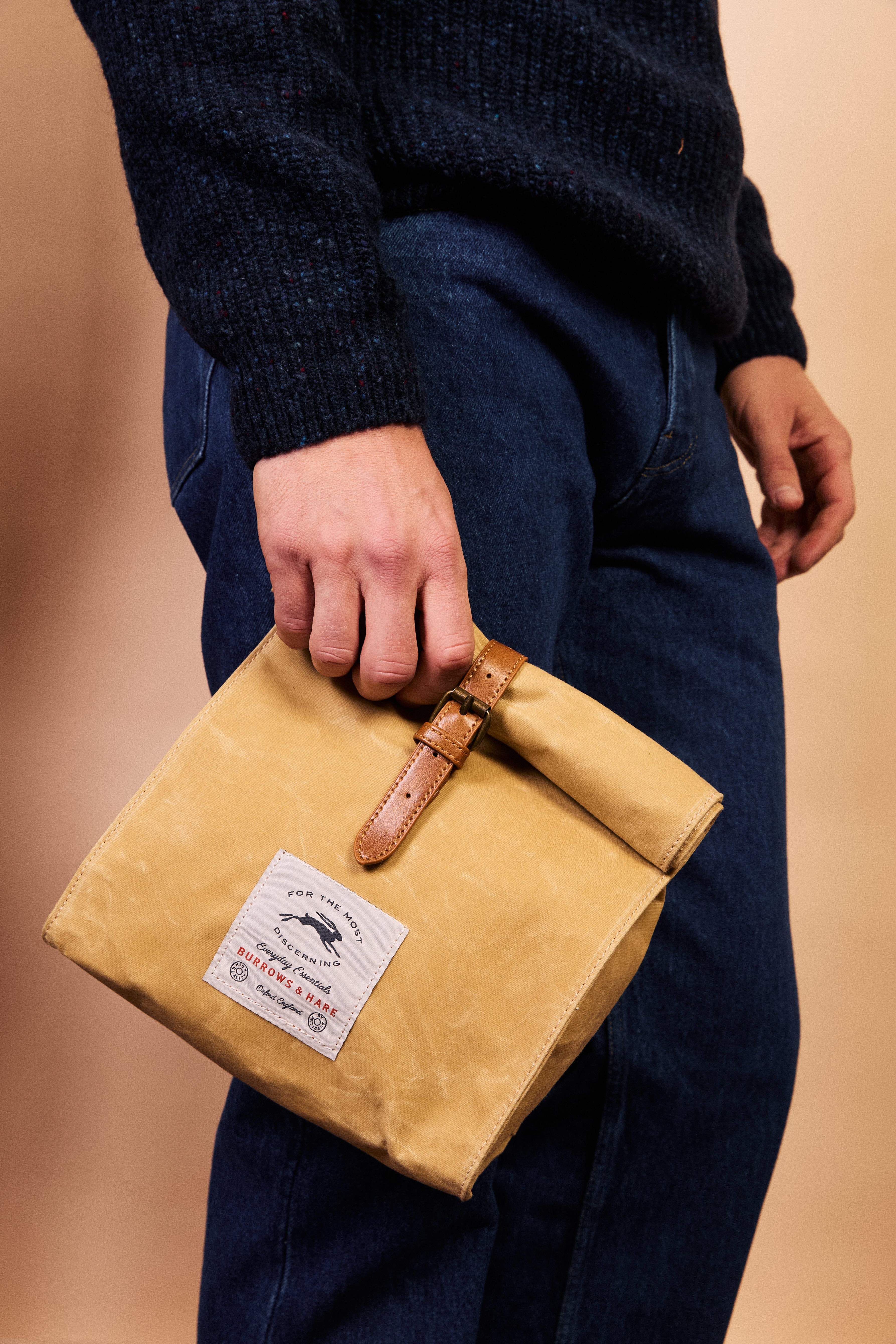 Side profile of the waxed canvas thermal lunch bag