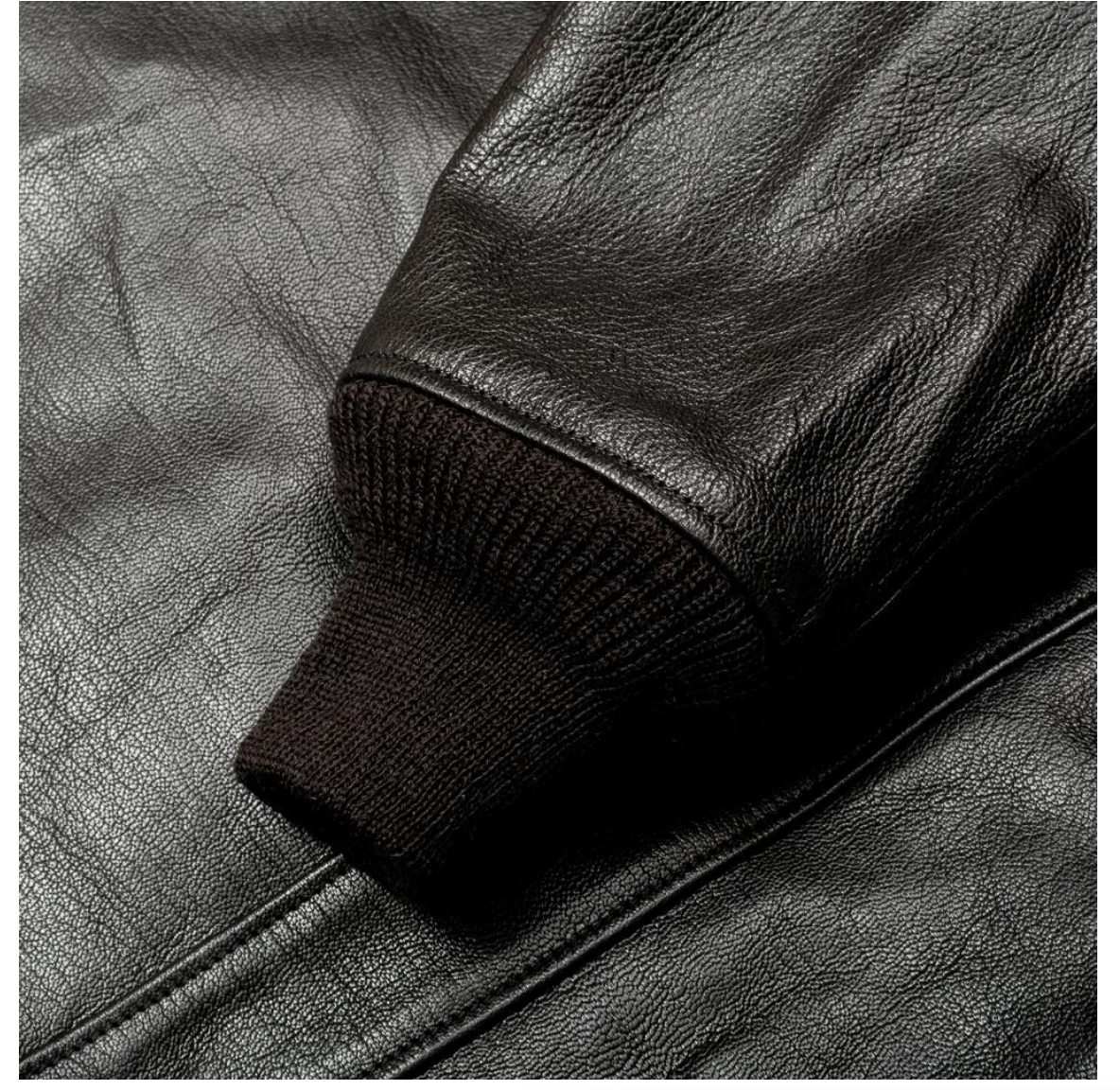 Front view of Buzz Rickson's Black AN6552 Goatskin jacket, iconic aviator style.